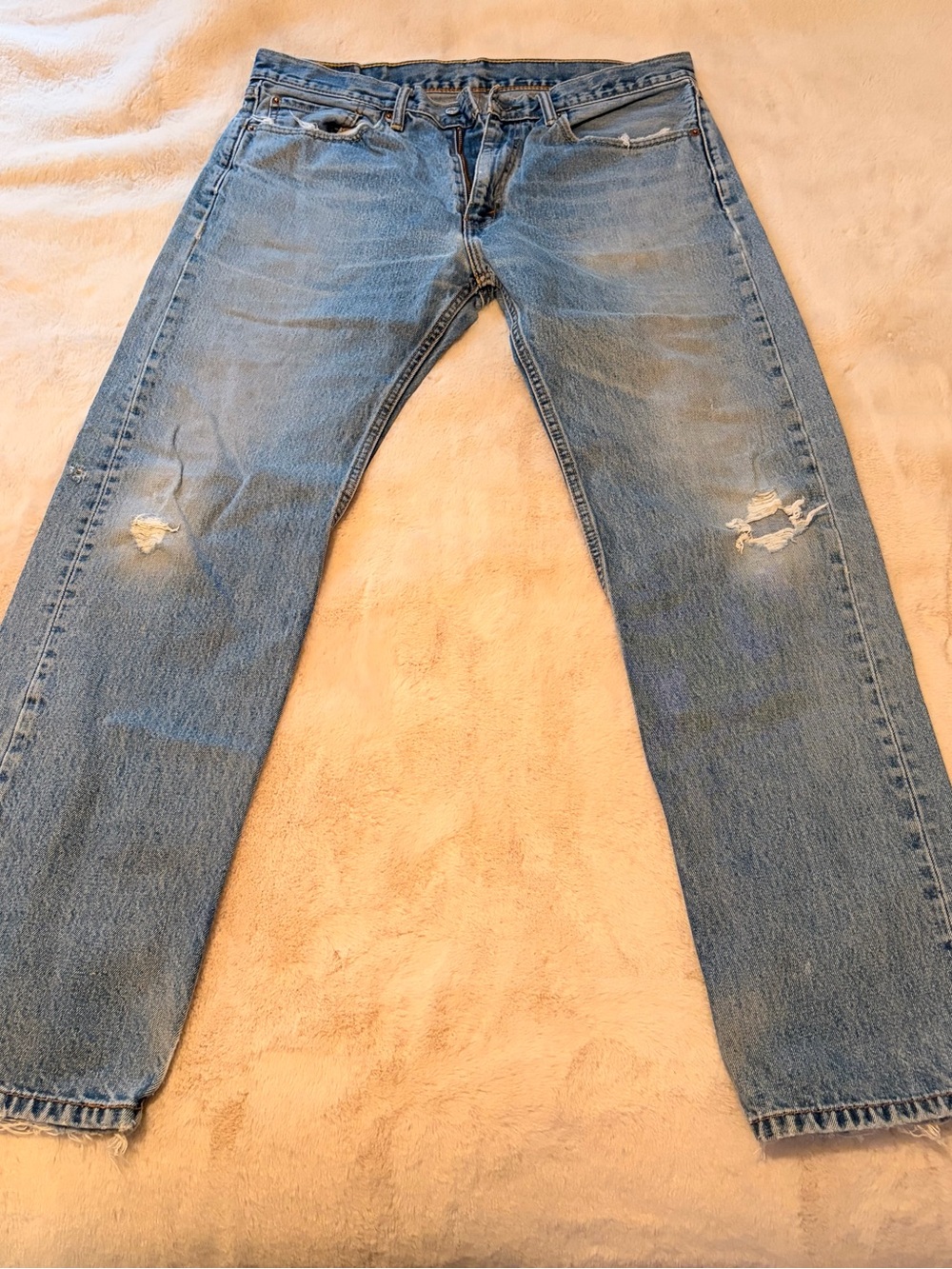 Levi's Light Blue Straight Leg Distressed Jeans